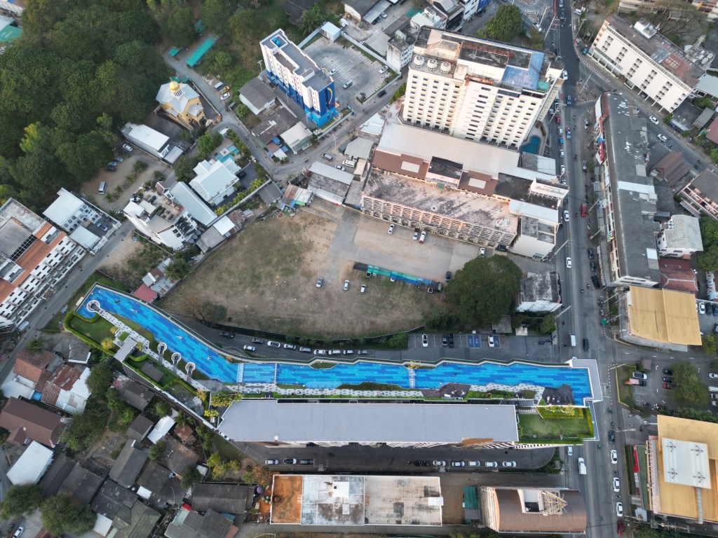 Rooftop pool at a condo building in Chiang Mai, Thailand during a slow travel stay
