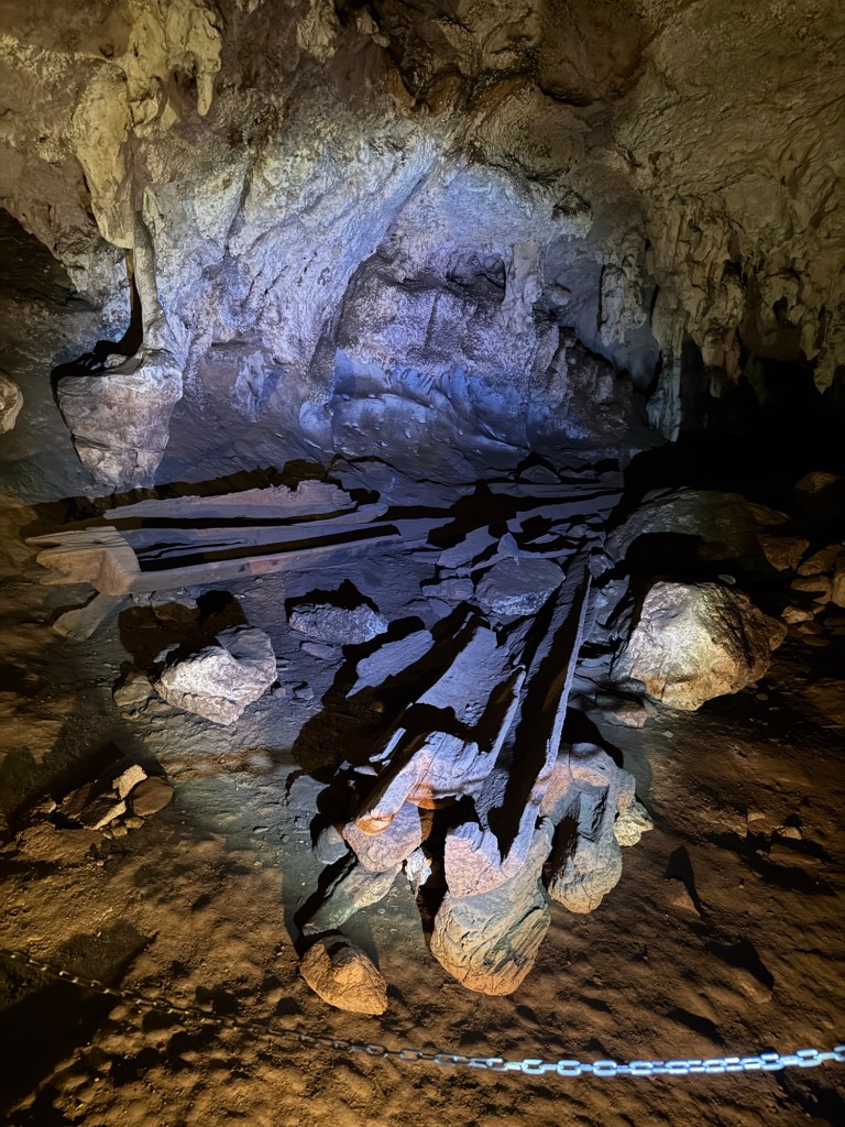 Ancient wooden coffins believed to be over 2,000 years old displayed inside Tham Lod Cave in northern Thailand.