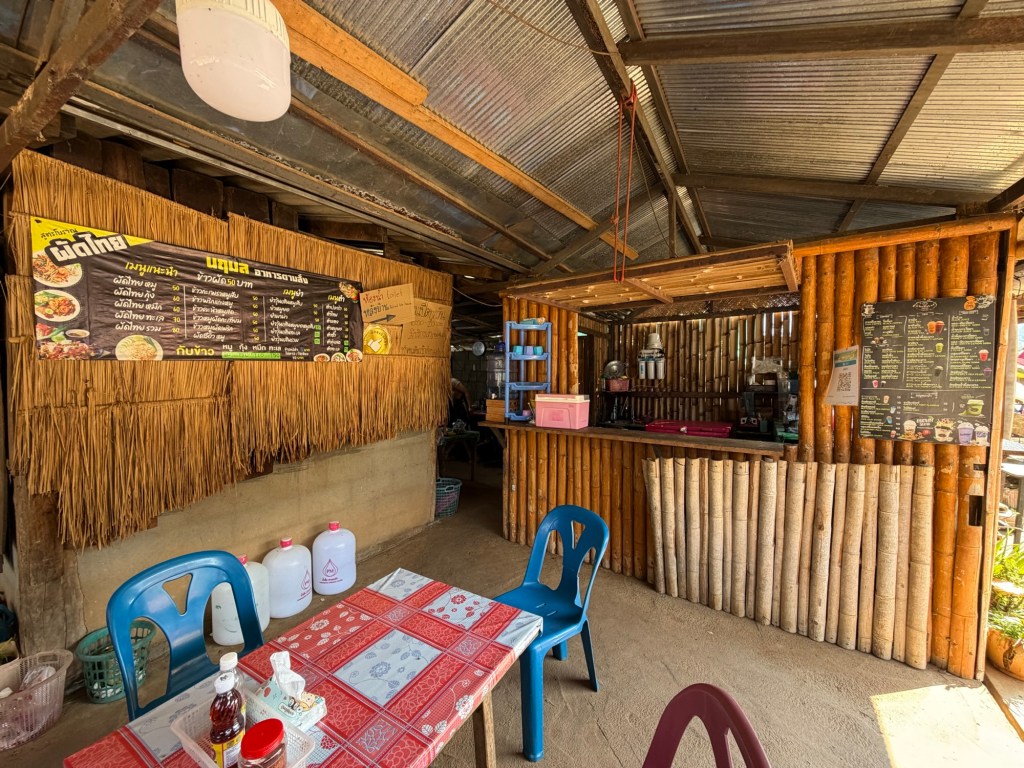 Small roadside café serving pad thai along the mountain road between Pai and Mae Hong Son in northern Thailand.