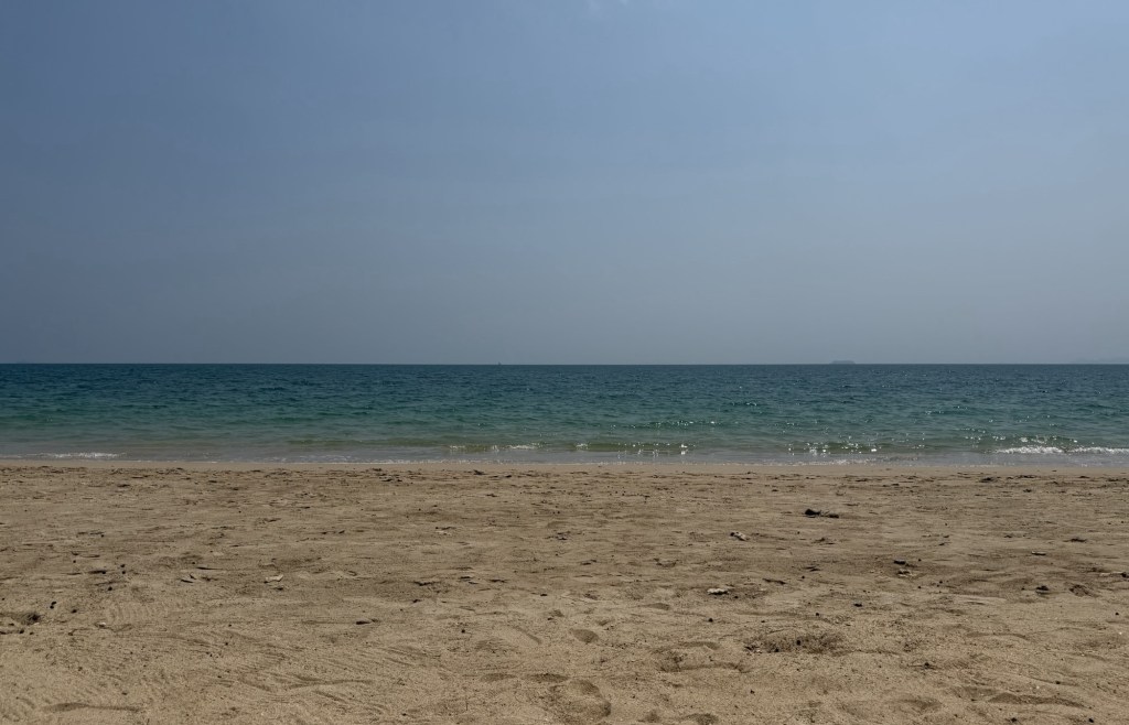 Quiet beach view during long-term family travel in Thailand