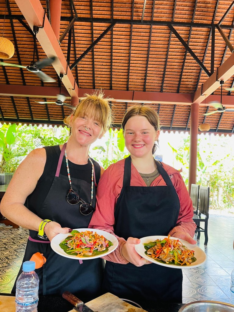 Mother and daughter during cooking class in Cambodia